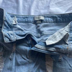 Holister blueJean skirt with rips/distressed denim
